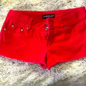 I am selling some red short shorts sides Small from ambiance apparel